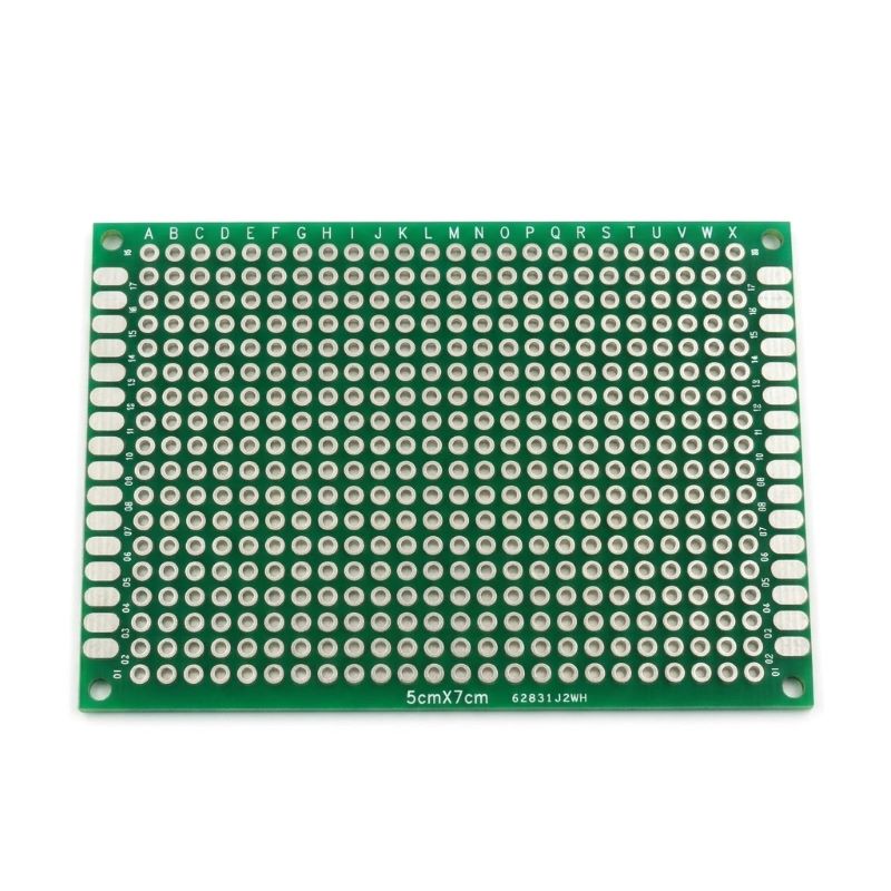 A 5x7cm double-sided green PCB prototype board, highlighting the pre-tinned plated through-holes and standard 2.54mm pitch grid for electronics soldering.
