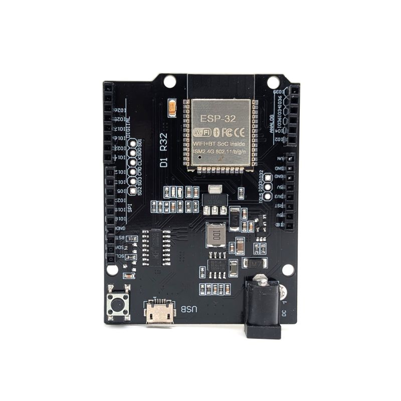 An ESP32 microcontroller development board with a black PCB, featuring a central ESP32 chip, various electronic components, a USB-C port, and a power jack, shown on a plain white background.