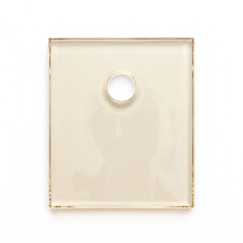 Pre-cut mica insulator pad for TO-218 and TO-247 power transistors, highlighting the pre-punched mounting hole and translucent mineral structure.