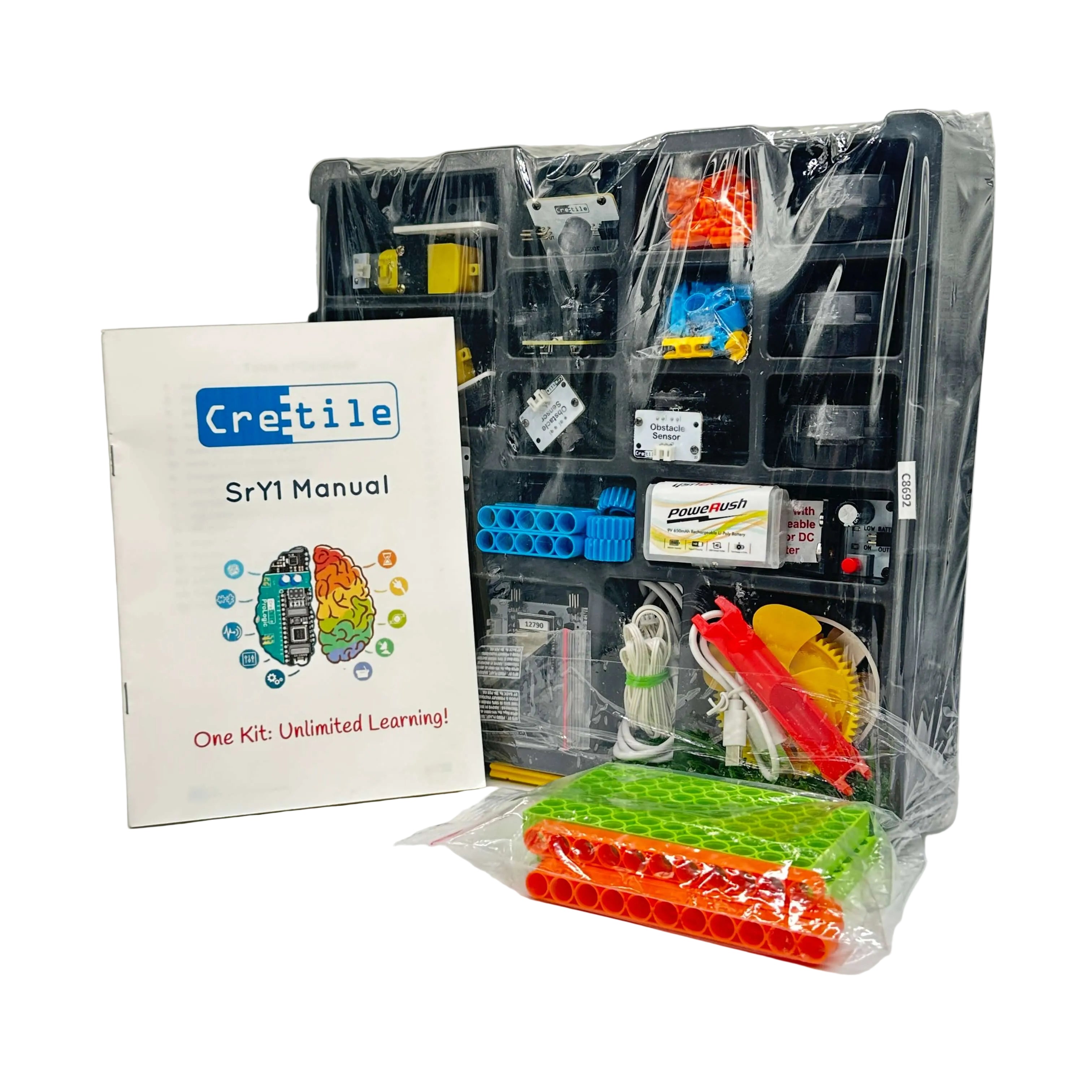 Educational STEM kit with components and manual on a white background